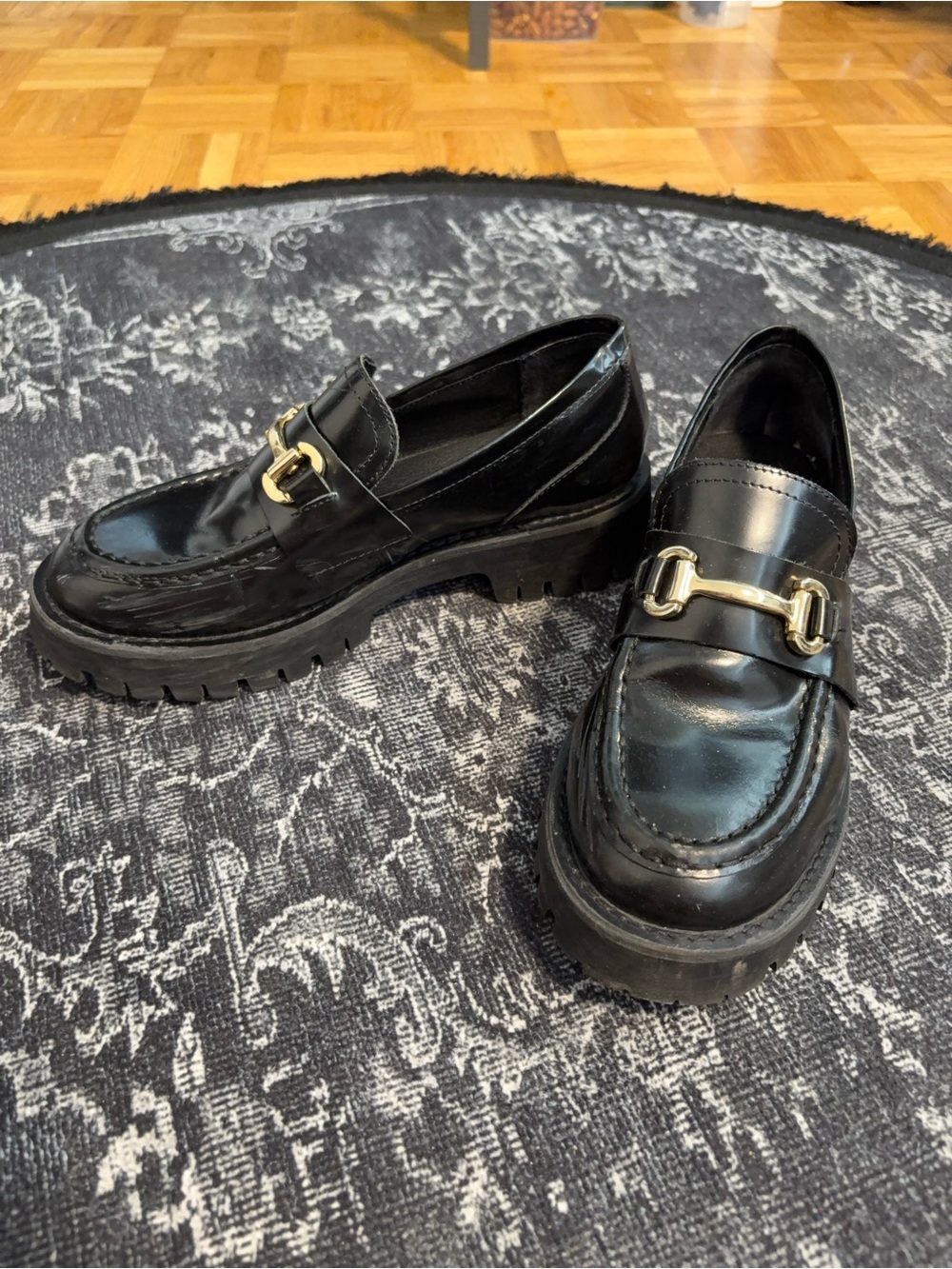 Steve Madden Black Patent Lug-Sole Loafers with Gold Bit